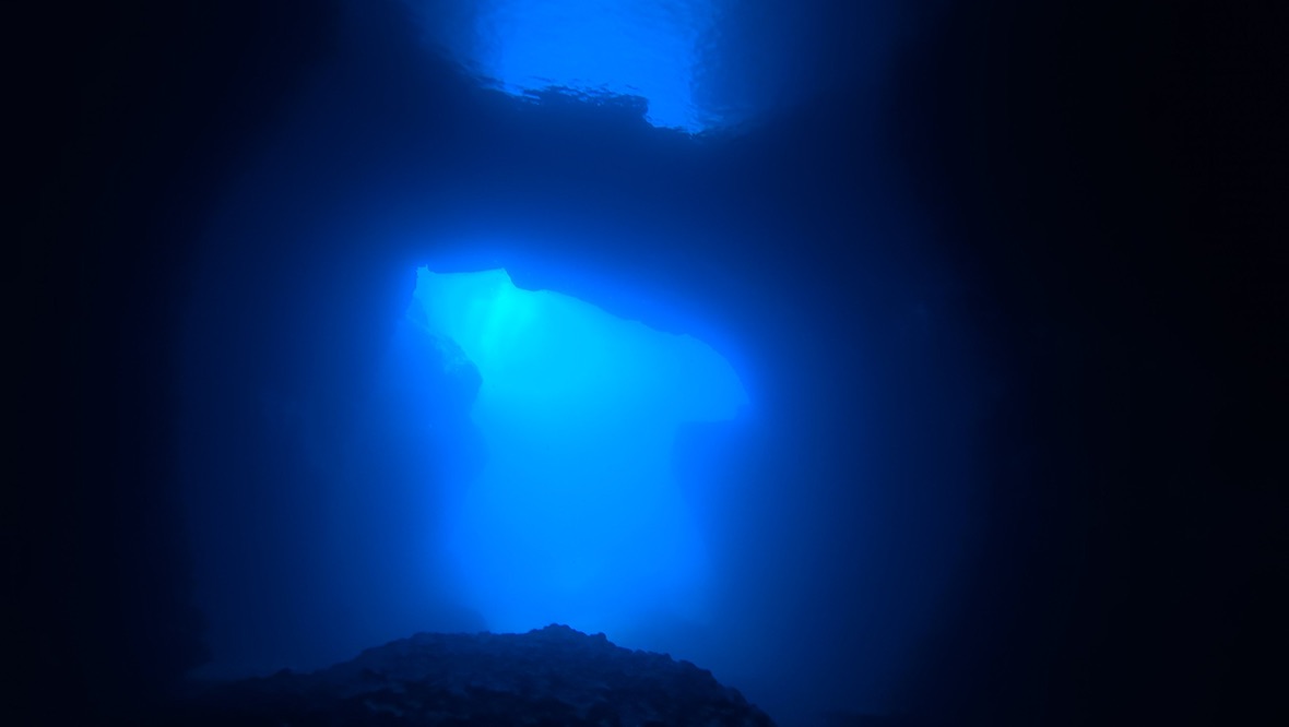 Light falling through the entrance of Cathedral Cave, Gozo